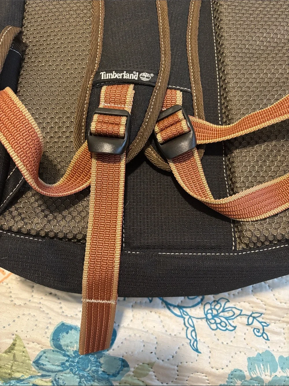 Timberland Black Canvas Backpack with Brown Trim and Orange Pull